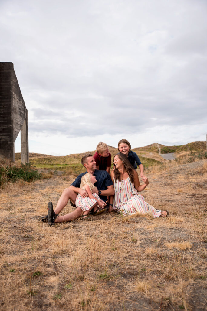 Family at Chambers Bay park posing for lifestyle family photos