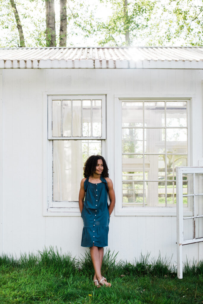 Posing outside the glass house at Wild Hearts Farm in Tacoma