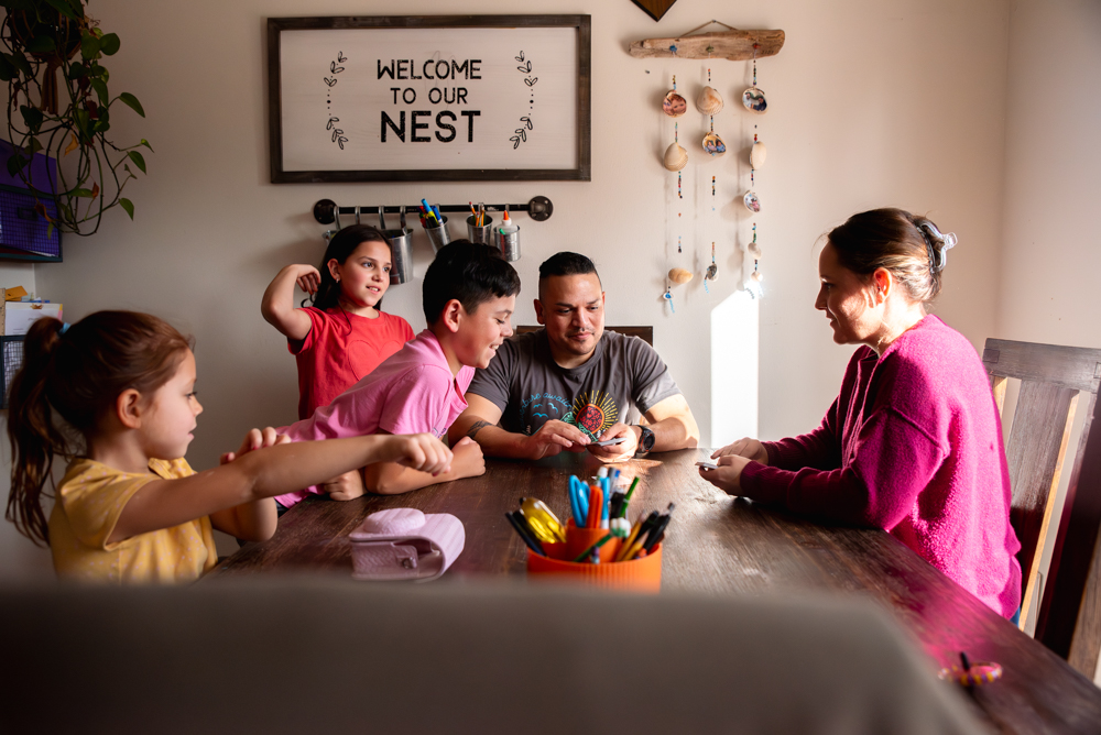 Lifestyle in-home family photography session capturing authentic connection Tacoma and Olympia Washington